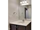 Bathroom features a modern vanity with a mirror and a chrome faucet at 7727 Weathered Oak Way, Raleigh, NC 27616