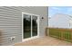 Home exterior view featuring a door leading to a wood deck and backyard at 78 Fair Child Rd, Spring Lake, NC 28390