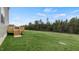 Large grassy backyard with deck area perfect for outdoor enjoyment at 78 Fair Child Rd, Spring Lake, NC 28390