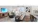 Open-concept living room with modern furnishings, a cozy sofa, and a contemporary design at 78 Fair Child Rd, Spring Lake, NC 28390