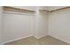 Walk-in closet with ample storage space featuring rods and shelves at 800 Mill Greens Ct, Raleigh, NC 27609