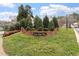 North Hills Place entrance sign with landscaping and greenery at 800 Mill Greens Ct, Raleigh, NC 27609