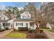 Charming two-story home with light siding, blue shutters, and a well-manicured front yard at 800 Mill Greens Ct, Raleigh, NC 27609