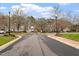 A scenic street view showing well-maintained homes and greenery at 800 Mill Greens Ct, Raleigh, NC 27609