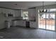 Bright kitchen featuring granite countertops, stainless appliances, and stylish flooring at 812 Kenmore Ave, Louisburg, NC 27549