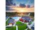 Aerial view featuring a pool, clubhouse, and recreation area in a Primary-planned community at 88 Windchime Ct, Fuquay Varina, NC 27526