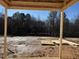 Backyard framed by the house's construction, showing potential for a future outdoor living space at 88 Windchime Ct, Fuquay Varina, NC 27526