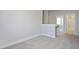 Upstairs hall with view of bedroom, bathroom, and neutral gray carpet at 88 Windchime Ct, Fuquay Varina, NC 27526