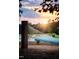 Comfortable hammock providing a perfect spot for relaxation beneath a peaceful sunset at 88 Windchime Ct, Fuquay Varina, NC 27526