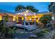 Beautiful backyard deck featuring a pergola with outdoor lighting and a hot tub at 1005 W Club Blvd, Durham, NC 27701