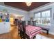 Formal dining room featuring hardwood floors, detailed trim, and lots of natural light at 1005 W Club Blvd, Durham, NC 27701