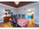 Traditional dining room features hardwood floors, a chandelier, and an antique buffet table with colorful decor at 1005 W Club Blvd, Durham, NC 27701