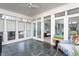 Bright sunroom featuring slate tile floors and lots of natural light at 1005 W Club Blvd, Durham, NC 27701