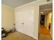 Spacious bedroom closet with double doors, offering plenty of storage space at 1513 E Franklin St # C129, Chapel Hill, NC 27514