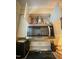 Kitchen featuring range, microwave and white cabinets at 1513 E Franklin St # C129, Chapel Hill, NC 27514