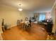 Spacious living room with dining area and wooden floors at 1513 E Franklin St # C129, Chapel Hill, NC 27514