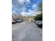 Open parking lot with ample parking for residents and guests in a well-maintained community at 1513 E Franklin St # C129, Chapel Hill, NC 27514