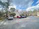 Community parking lot with ample parking spaces available for residents and visitors at 1513 E Franklin St # C129, Chapel Hill, NC 27514