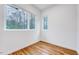 Bright bedroom with natural light and hardwood floors offers a calming and minimalist space at 1604 Malta Ave, Raleigh, NC 27610