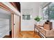 Stylish entryway with hardwood floors, bright white walls, and a glimpse of the storage area at 1604 Malta Ave, Raleigh, NC 27610