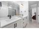 Modern bathroom featuring a double sink vanity, quartz countertop and tile flooring at 1804 Clifton Pines Dr, Cary, NC 27519