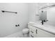 Bright bathroom with large mirror, quartz countertop, and tile flooring at 1804 Clifton Pines Dr, Cary, NC 27519