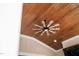 Interior view showcasing the vaulted wood plank ceiling and decorative ceiling fan in sunroom at 1804 Clifton Pines Dr, Cary, NC 27519