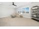 Cozy living space with neutral walls, comfortable seating, and lots of bright, natural light at 1804 Clifton Pines Dr, Cary, NC 27519
