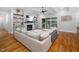 Open concept living room with fireplace, built-in shelves and access to the backyard at 1804 Clifton Pines Dr, Cary, NC 27519