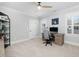 Bright, spacious office with carpet, shutters on windows, and wooden desk at 1804 Clifton Pines Dr, Cary, NC 27519