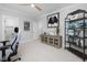 Bright office with light-colored walls, carpet, and built-in dark shelving unit at 1804 Clifton Pines Dr, Cary, NC 27519
