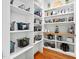 Walk-in pantry with custom shelving to maximize storage at 1804 Clifton Pines Dr, Cary, NC 27519