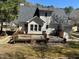 Expansive backyard with a spacious deck, ideal for outdoor entertaining and enjoying the serene surroundings at 1811 Kelly Glen Dr, Apex, NC 27502