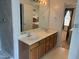 Spacious bathroom with a double sink vanity and a large mirror at 1811 Kelly Glen Dr, Apex, NC 27502