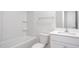Clean bathroom with a tub/shower combo, toilet, and a vanity with a sink and mirror at 1912 Frost Dr, Haw River, NC 27258