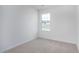 Carpeted bedroom with neutral walls and bright natural light at 1912 Frost Dr, Haw River, NC 27258