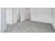 Spacious living room with sleek, modern flooring and ample natural light at 1912 Frost Dr, Haw River, NC 27258