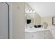 Attic bathroom features a single sink vanity with drawers and a large mirror at 204 Brittany Pl, Cary, NC 27511