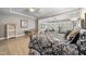 Bright bedroom space featuring exercise equipment, natural light, and a queen bed at 204 Brittany Pl, Cary, NC 27511