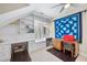 Bonus room features multiple built in desks, storage and an abundance of natural light at 204 Brittany Pl, Cary, NC 27511