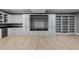 Spacious living room with built-in cabinets and shelving, offering an open and airy space at 204 Brittany Pl, Cary, NC 27511