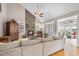 Inviting living room with stone fireplace, high ceilings, and ample natural light at 204 Brittany Pl, Cary, NC 27511