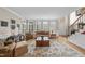 Cozy living room featuring a neutral color palette, comfortable seating, and ample natural light at 204 Brittany Pl, Cary, NC 27511