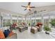 Bright sunroom with multiple windows offering ample natural light and a relaxing atmosphere at 204 Brittany Pl, Cary, NC 27511