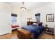 Comfortable bedroom with a window seat, natural light, and a warm ambiance at 2606 W Knox St, Durham, NC 27705
