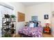 Bright bedroom with a large window, plants, creating a cozy and inviting atmosphere at 2606 W Knox St, Durham, NC 27705