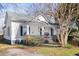 Inviting exterior featuring a covered porch and a well-manicured front yard at 2606 W Knox St, Durham, NC 27705