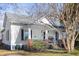 Charming two-story home with covered front porch and landscaped yard at 2606 W Knox St, Durham, NC 27705