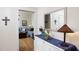 Hallway view of the living room with hardwood floors and neutral decor at 2606 W Knox St, Durham, NC 27705
