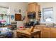 Charming kitchen features light wood cabinets, butcher block island, and ample storage at 2606 W Knox St, Durham, NC 27705